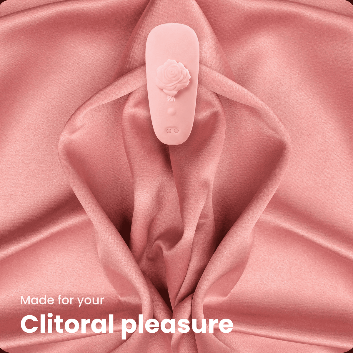 MsChief Anywear pink clitoral wearable vibrator placed on pink satin fabric for intimate pleasure MsChief Anywear pink clitoral wearable vibrator placed on pink satin fabric for intimate pleasure